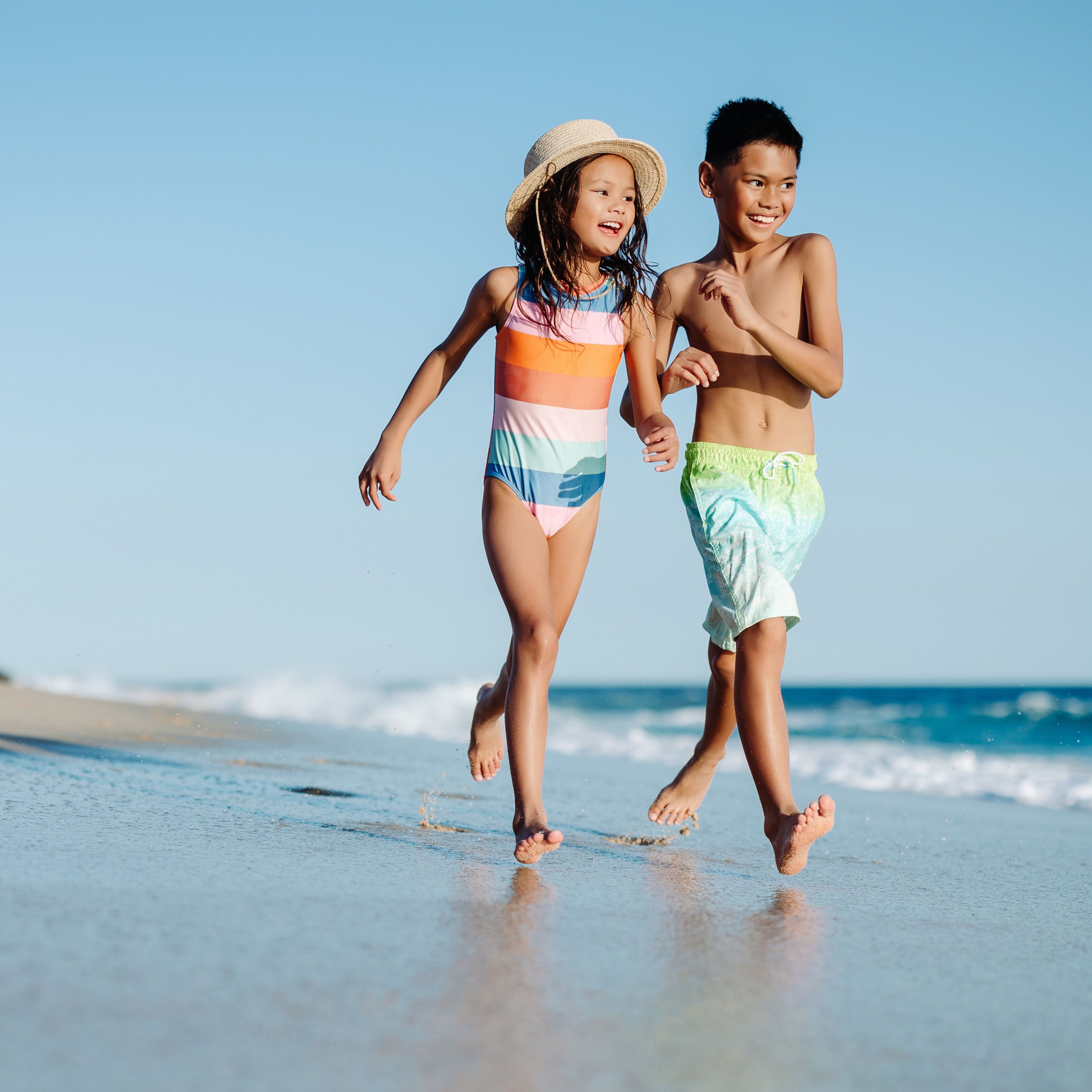 children walking on the beach